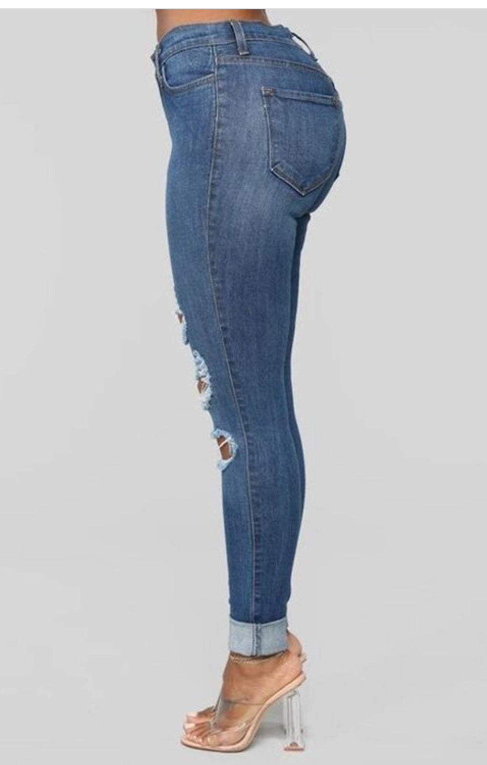 Vaqueros ajustados de talle alto con roturas de Denim Queen